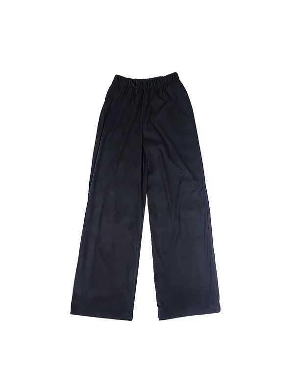 Velour sweatpants worn with a heavy cotton top, photographed in the Vilnius studio